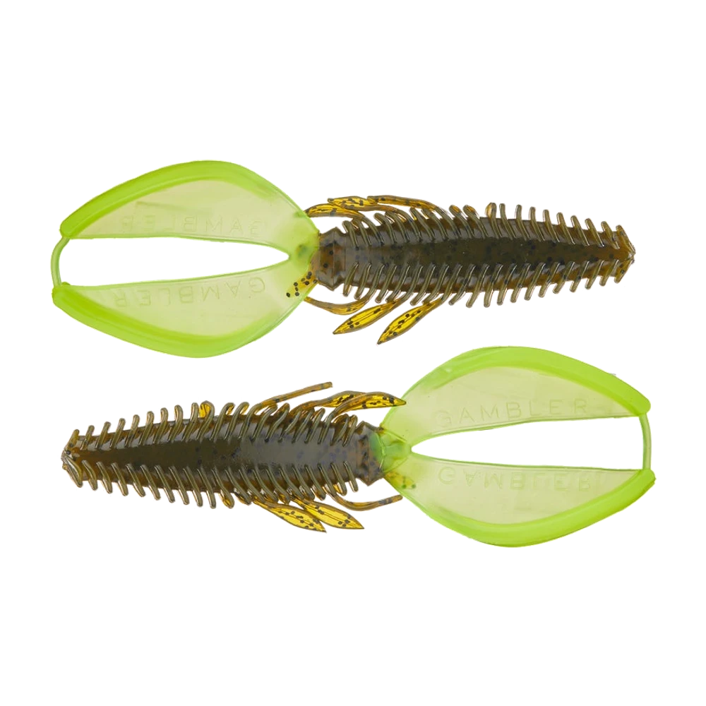 Deux Gambler Super Stinger 5.25 nus, sans hameçon, vus de dessus : corps green pumpkin pailleté noir à chevrons annelés bordés de fines pattes, et deux grandes pinces plates jaune chartreuse translucides marquées GAMBLER en relief