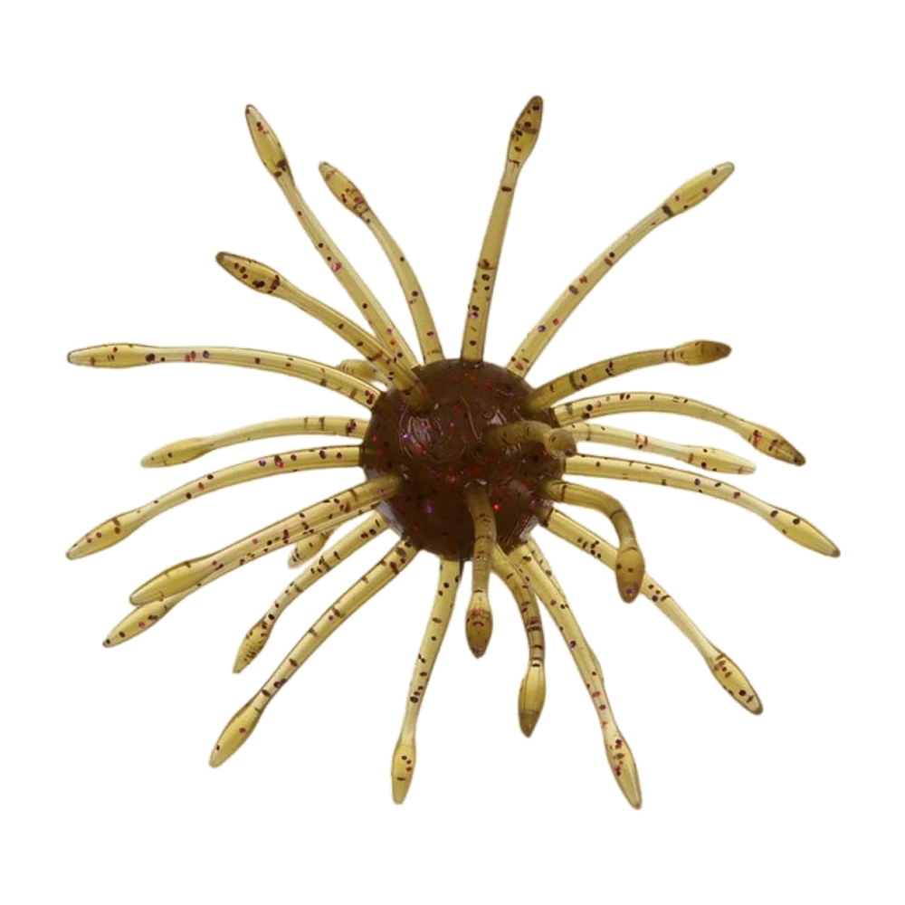 Gary Yamamoto Uni, corps sphérique brun-vert translucide à paillettes rouges d'où rayonnent une vingtaine de longs appendices beiges mouchetés terminés par un petit renflement, leurre photographié nu
