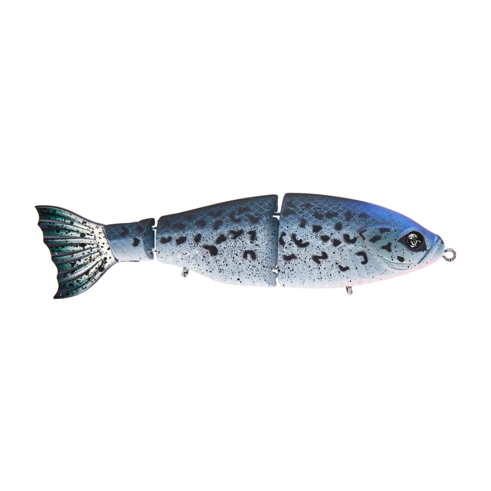 Googan Fat Shaddy Swimbait en livrée truite, dos bleuté marbré de noir, flancs argentés mouchetés, gorge rosée, corps segmenté par trois jointures, queue souple vert et noir ; deux porte-hameçons ventraux visibles mais aucun triple monté