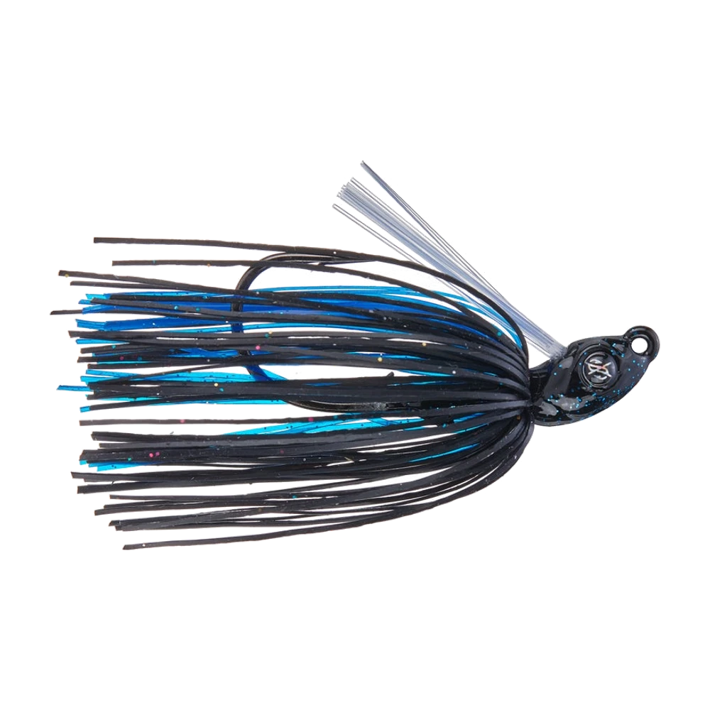 Googan Grass Hero Swim Jig noir et bleu, tête compacte pointue à paillettes avec œil peint, anneau de tête vertical, garde-herbe en fibres claires, jupe nouée noire et bleue, monté sans trailer