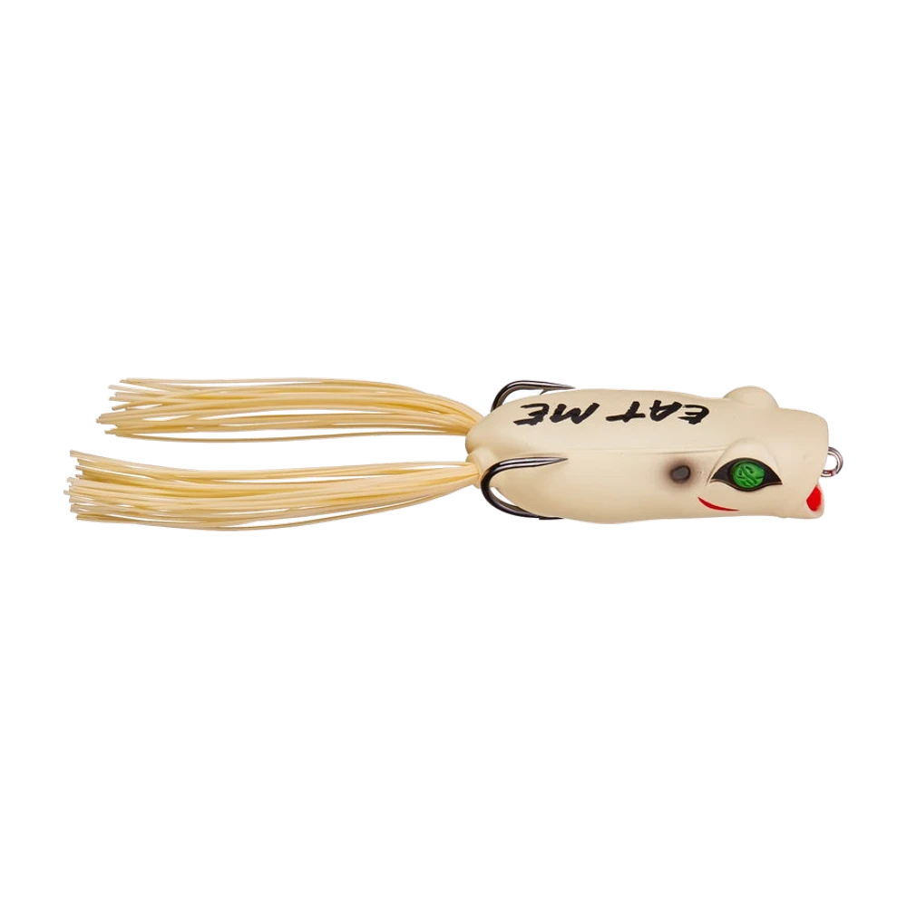 Googan Poppin Filthy Frog blanc crème avec l'inscription EAT ME en noir sur le dos, œil vert, lèvres rouges peintes, jupe silicone crème et hameçon double plaqué le long du dos