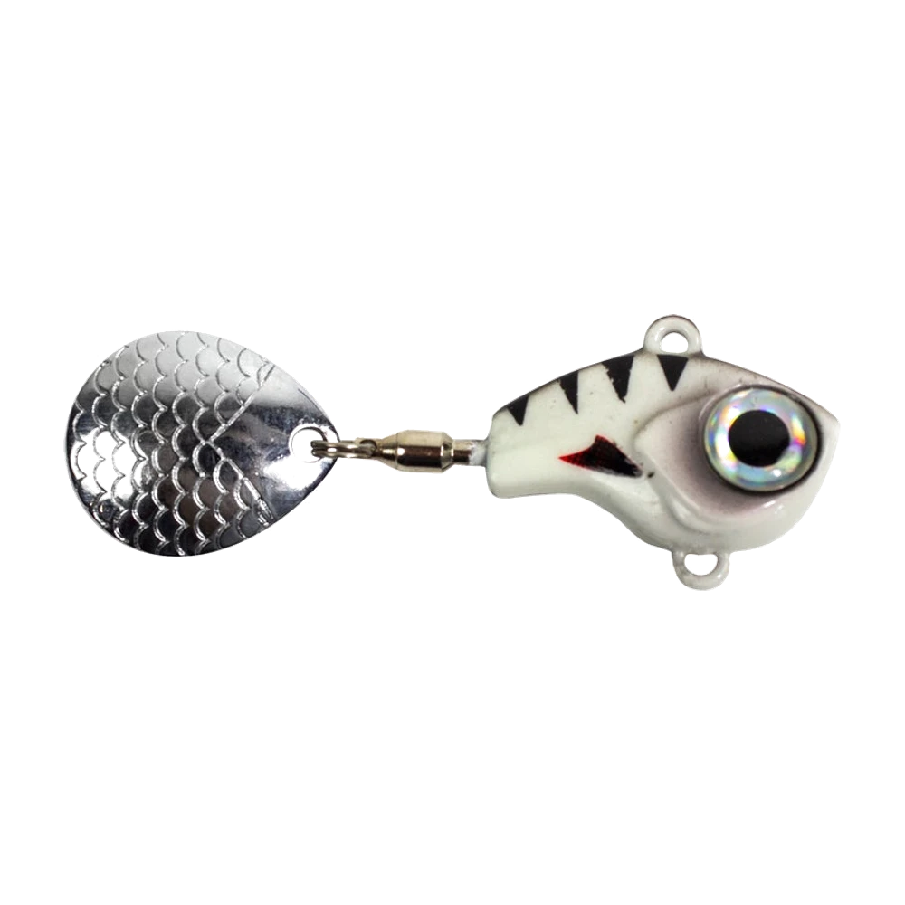Lunkerhunt Big Eye Tail Spin Jig photographié sans hameçon : corps compact peint en blanc avec chevrons noirs et trait de ouïe rouge, œil holographique surdimensionné, anneau de tête et anneau ventral vides, palette argentée martelée en écailles reliée au corps par un émerillon