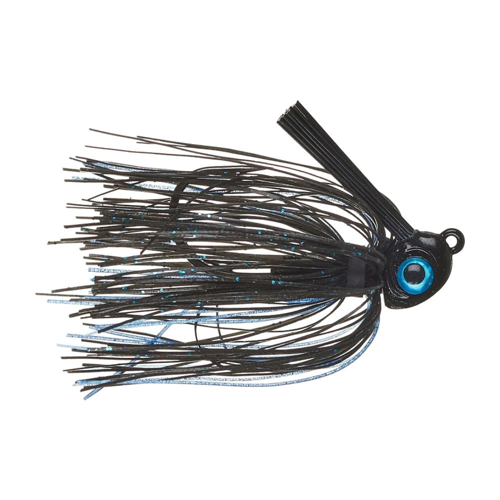 Missile Baits Mini Swim Jig, tête noire compacte avec un gros œil 3D bleu cerclé de noir, anneau d'attache incliné sur le dessus, jupe silicone noire à paillettes et brins bleus, garde-herbe en fibres noires