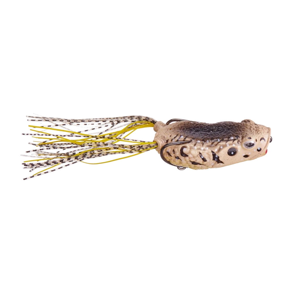 Molix Pop Frog coloris grenouille naturelle brun et beige, corps creux à peau texturée, yeux 3D, double hameçon affleurant sur le dos, jupe de brins jaunes et noir et blanc rayés, petit anneau sous l'arrière du corps