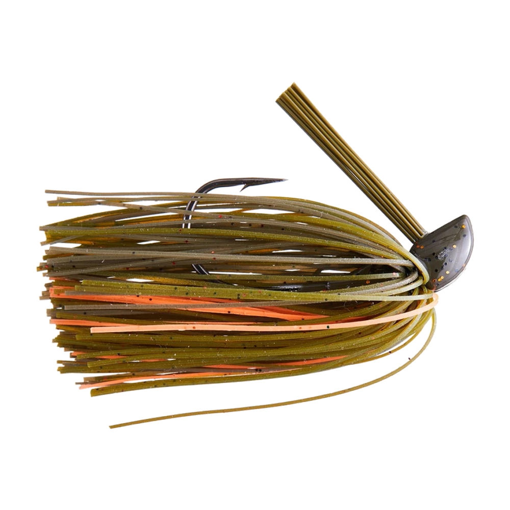 Strike King Compact Tungsten Casting Jig à tête compacte en biseau brun translucide avec paillettes orange, dorées et bleu-noir, jupe silicone vert pumpkin et olive mêlée de brins orange et pêche, brosse de fibres faisant office de garde et hameçon fort dont la pointe barbelée ressort au-dessus de la jupe