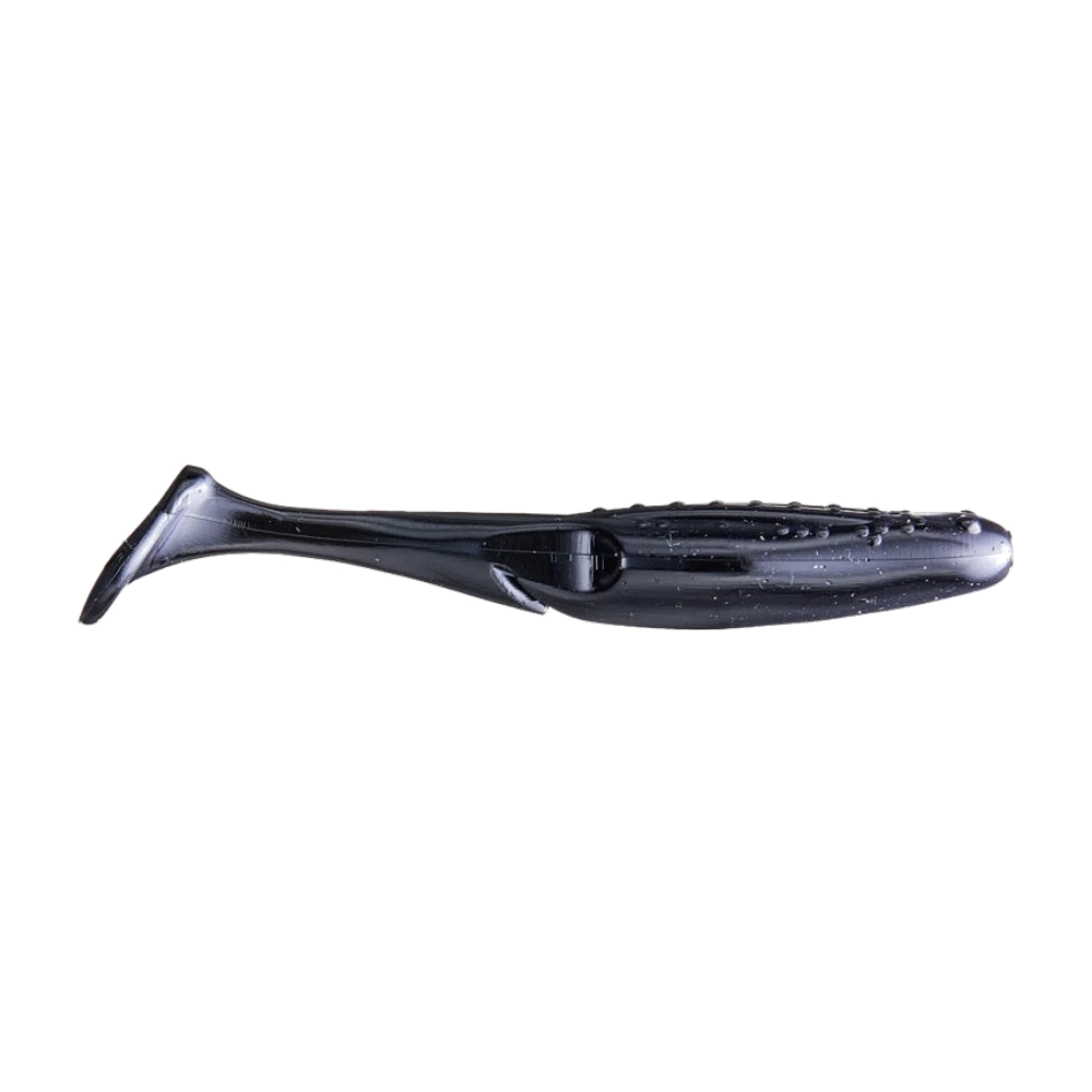 Zoom Uni Toad Swimbait, leurre souple noir à fines paillettes argentées, corps plat de toad avec une rangée de petits picots sur le dos, fente ventrale visible et palette unique inclinée à l'arrière, présenté nu sans hameçon